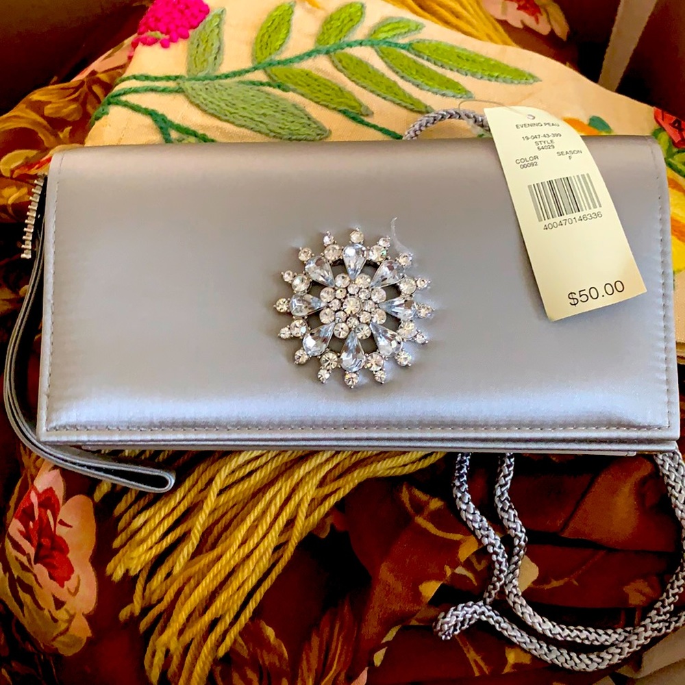 Valerie Steven’s clutch purse with strap
